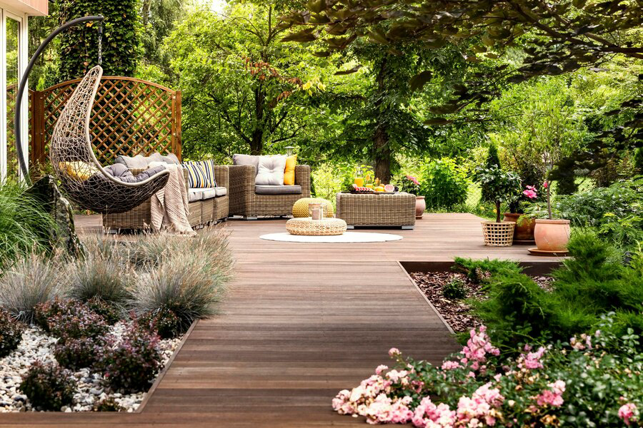 wooden-terrace-surrounded-by-greenery_828688-5241