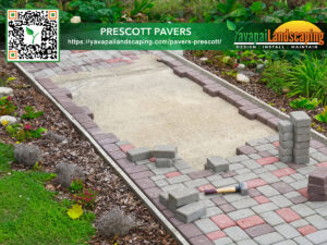 A neatly constructed garden pathway with red and grey paving stones, surrounded by rich greenery, showcasing the craftsmanship of yavapai landscaping with contact information for prescott pavers.