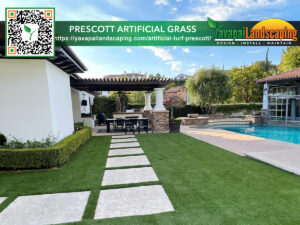 A luxurious backyard featuring perfectly manicured artificial grass with a stylish stepping stone pathway leading to a cozy outdoor dining area, complemented by a sparkling pool and elegant landscaping, presented by prescott artificial grass and yavapai landscaping.
