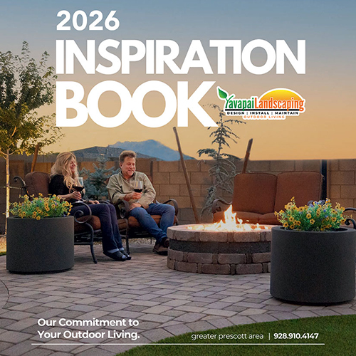 A man and woman sit by a fire pit in a landscaped backyard, holding mugs. Text reads "2026 Inspiration Book," "Yavapai Landscaping," and "Prescott Landscaping&mdash;Our Commitment to Your Outdoor Living. Greater Prescott area. 928.910.4147.