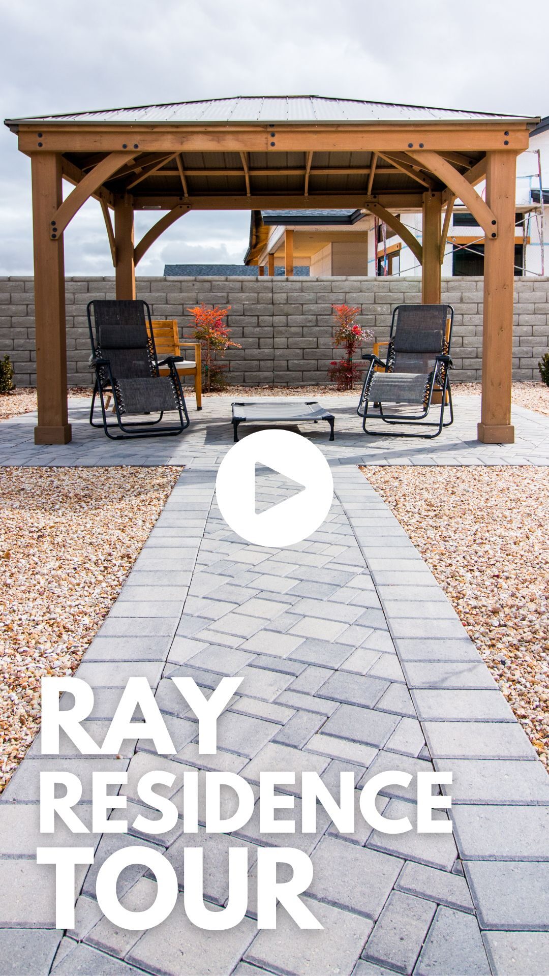 Outdoor living space featuring a wooden gazebo with two chairs, interlocking paver walkway, and decorative plants, promoting Yavapai Landscaping's residential design services.